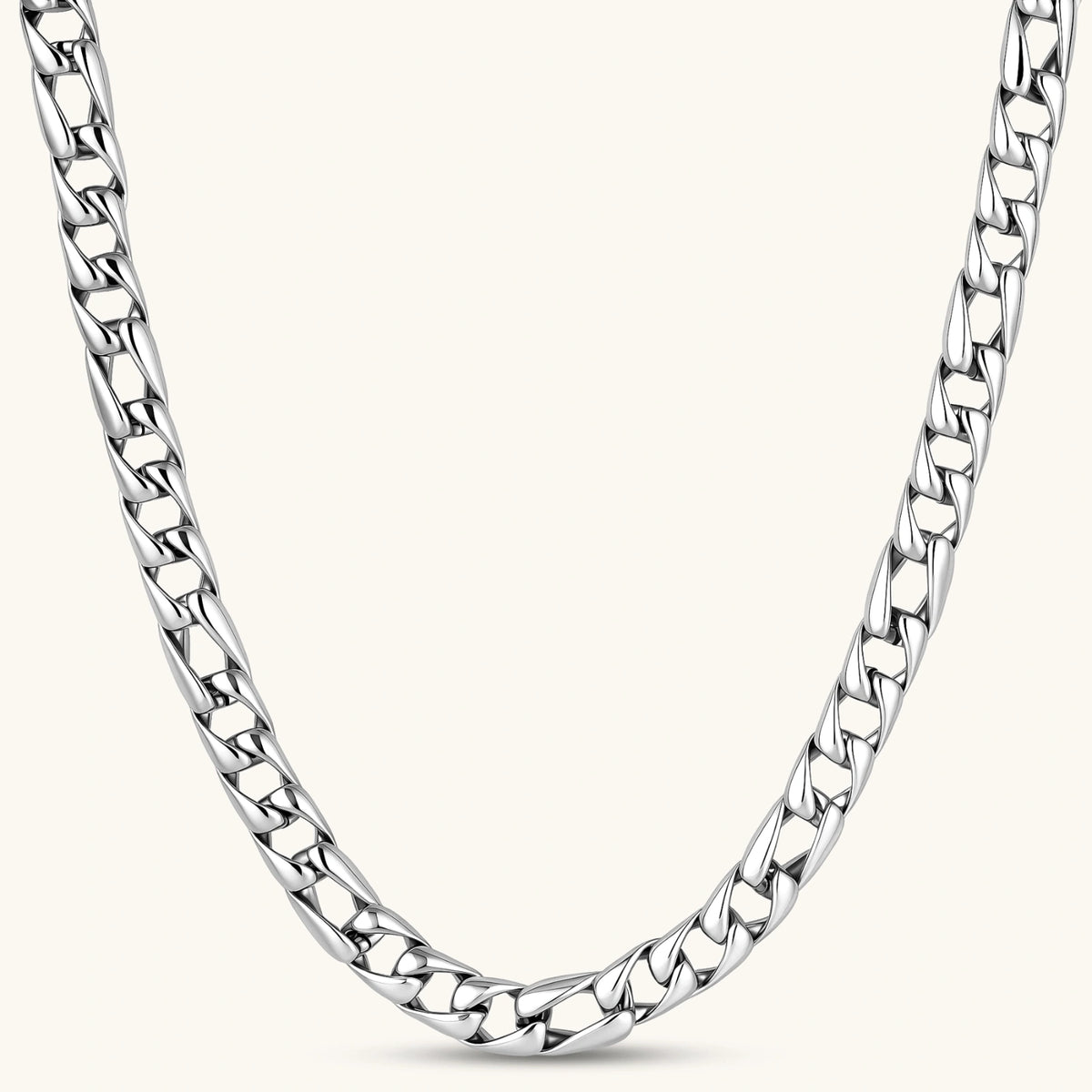 Chunky antique silver plated eco-brass curb chain necklace with a lobster clasp and Greek key detail on a cream background.