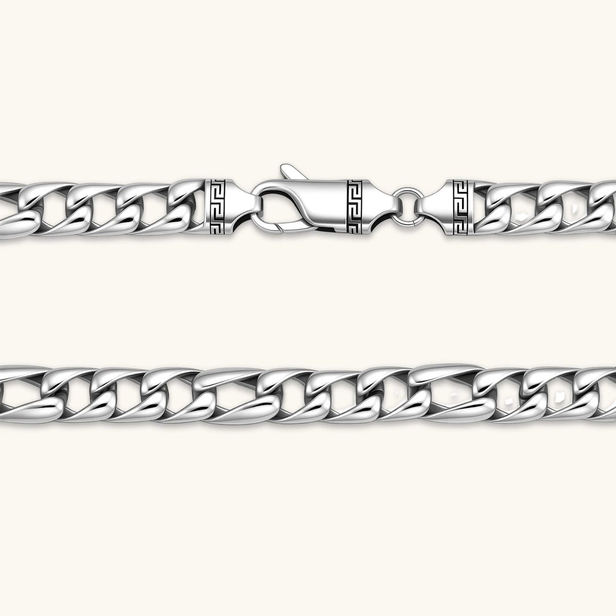 Chunky antique silver plated eco-brass curb chain necklace with a lobster clasp and Greek key detail on a cream background.